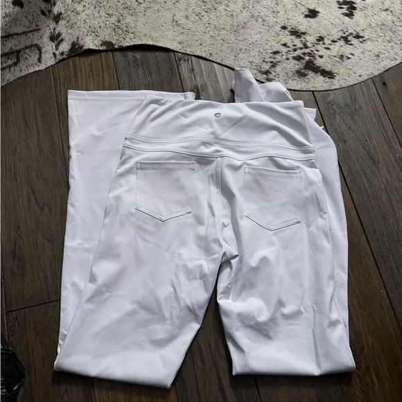 65. Halara High Waisted Back Pocket Flare Yoga Leggings in White - Picture 4 of 4